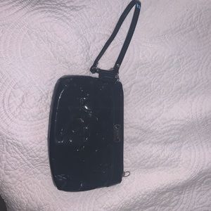 Black patent coach wristlet